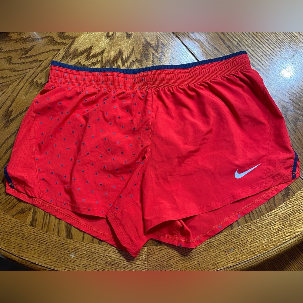 Red Nike athletic shorts